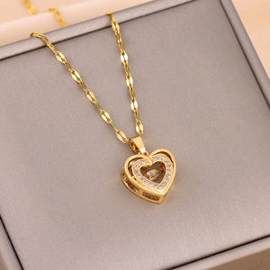 C48 - Golden necklace with heart pendant